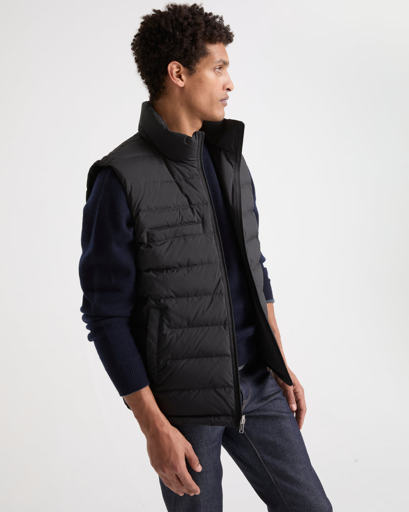 Down waistcoat in waterproof technical fabric