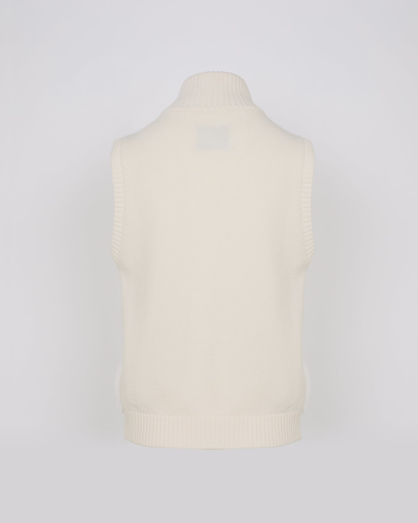Short knitted gilet in merino and mink fur