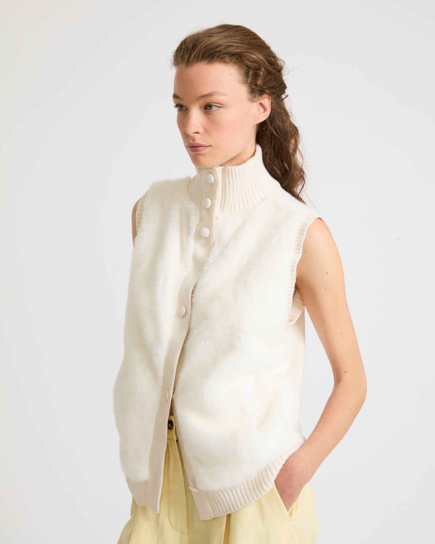 Short knitted gilet in merino and mink fur
