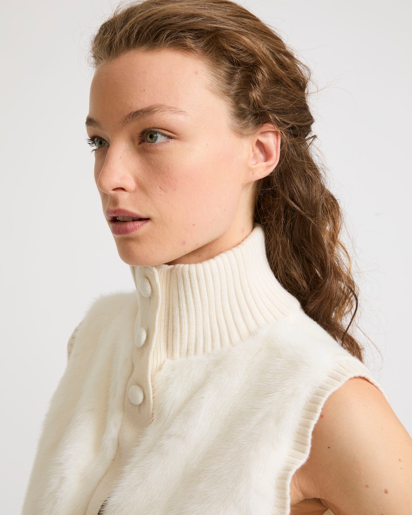 Short knitted gilet in merino and mink fur