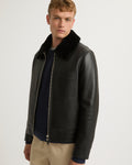 Leather jacket with shearling collar