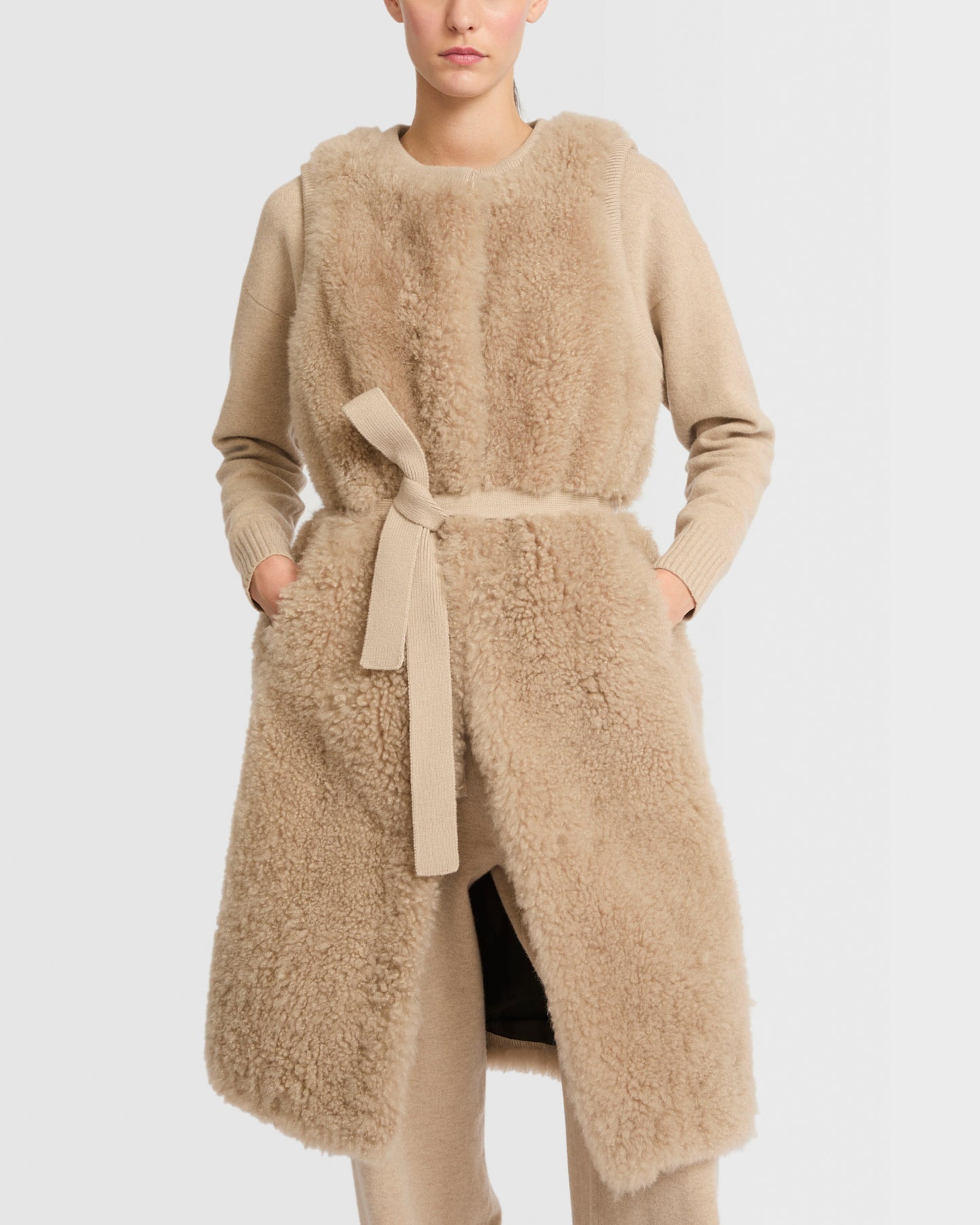 Long belted gilet in merino knit and lambskin