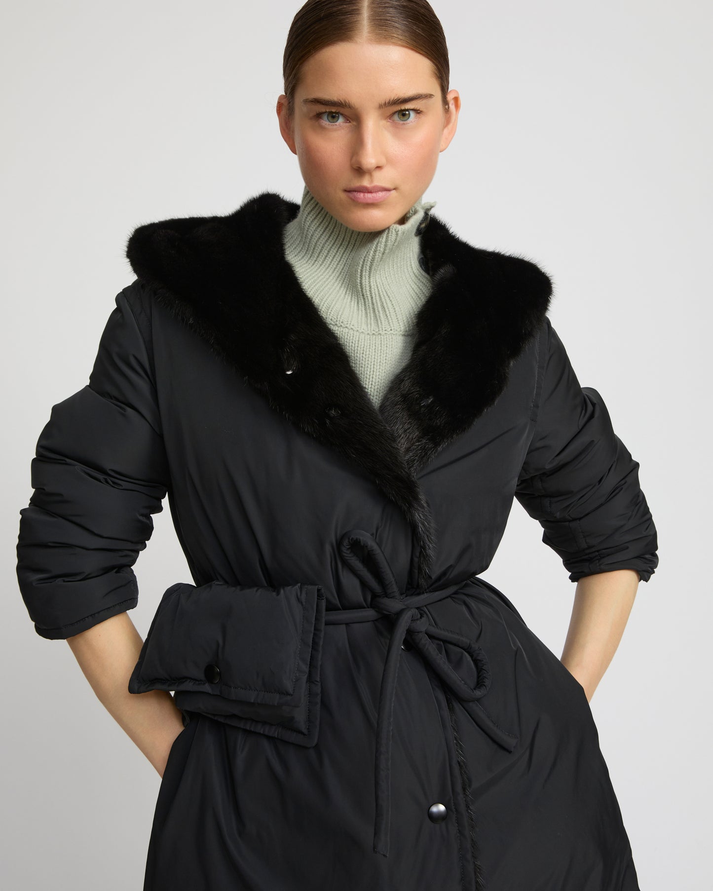 Long down jacket in technical fabric and mink fur