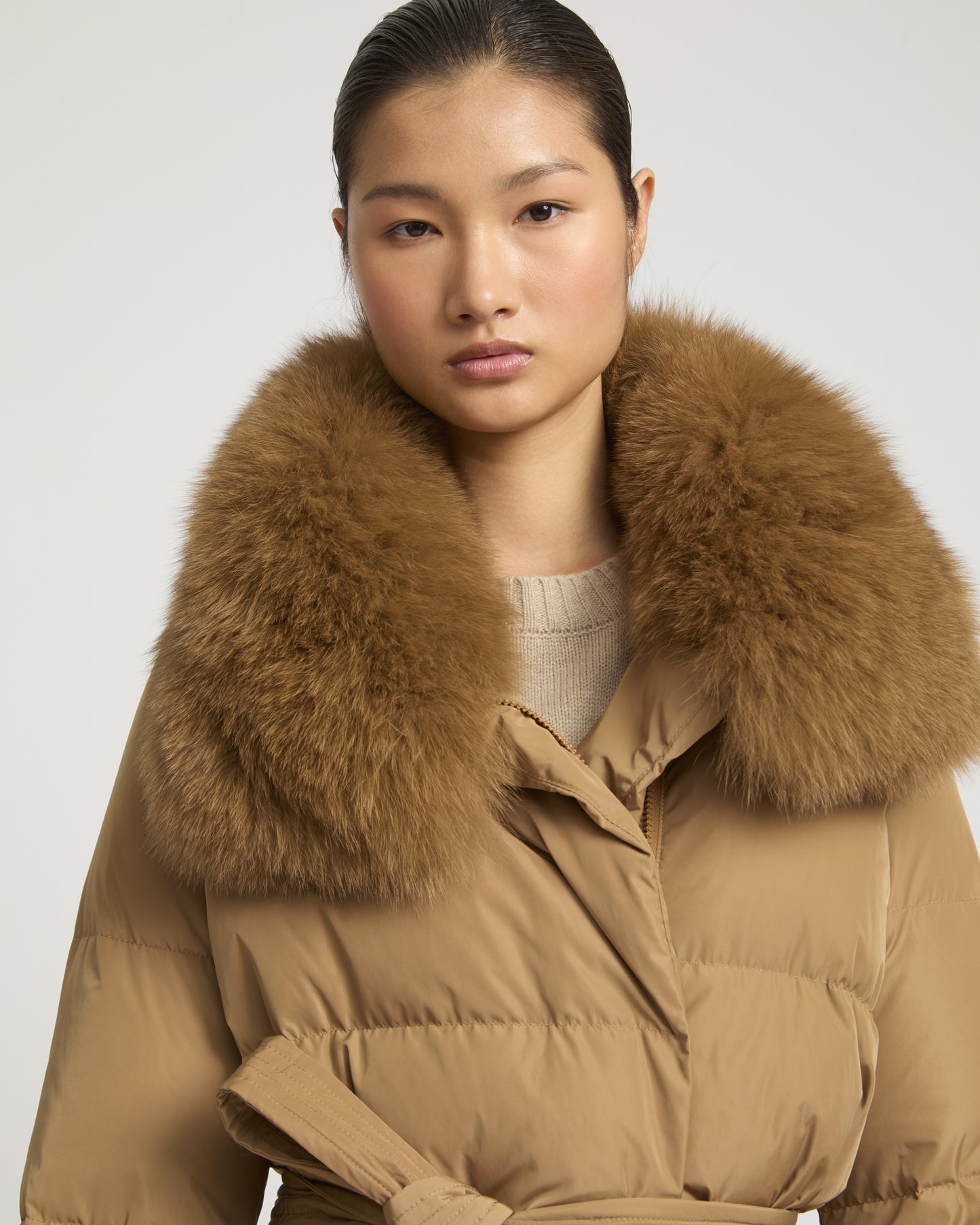 Long belted down jacket in technical fabric with detachable fox fur collar