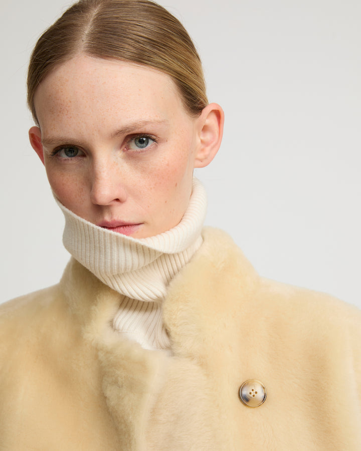 Straight belted shearling coat