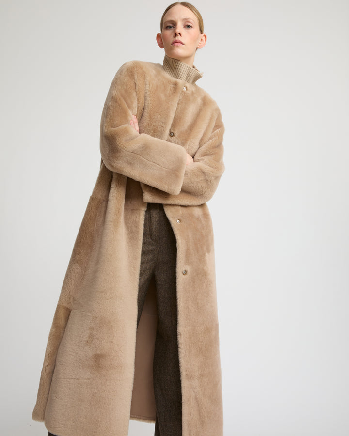 Extra long draped lambskin shearling coat