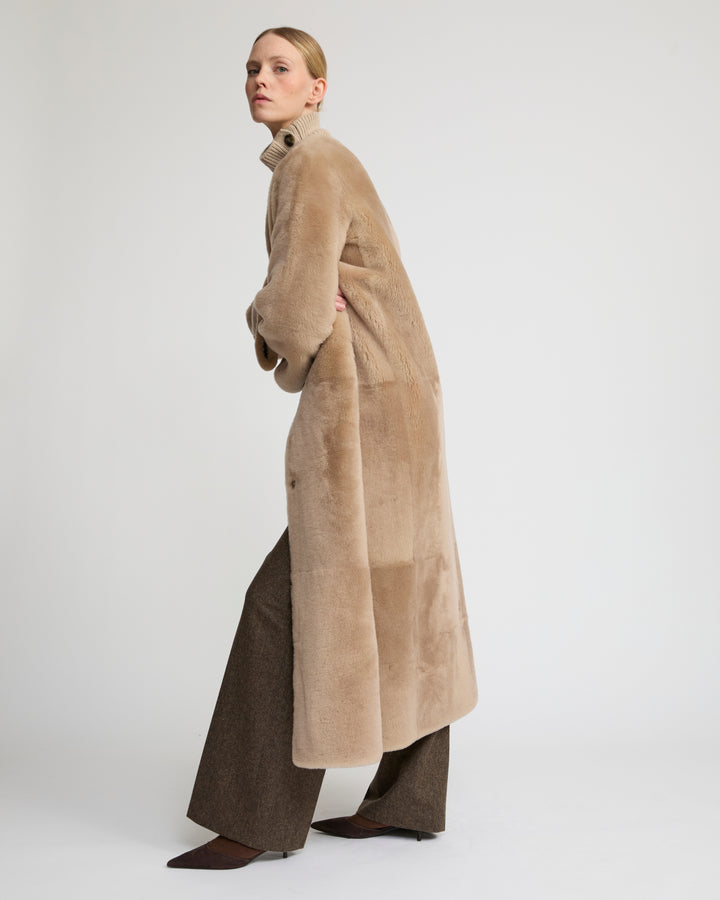 Extra long draped lambskin shearling coat