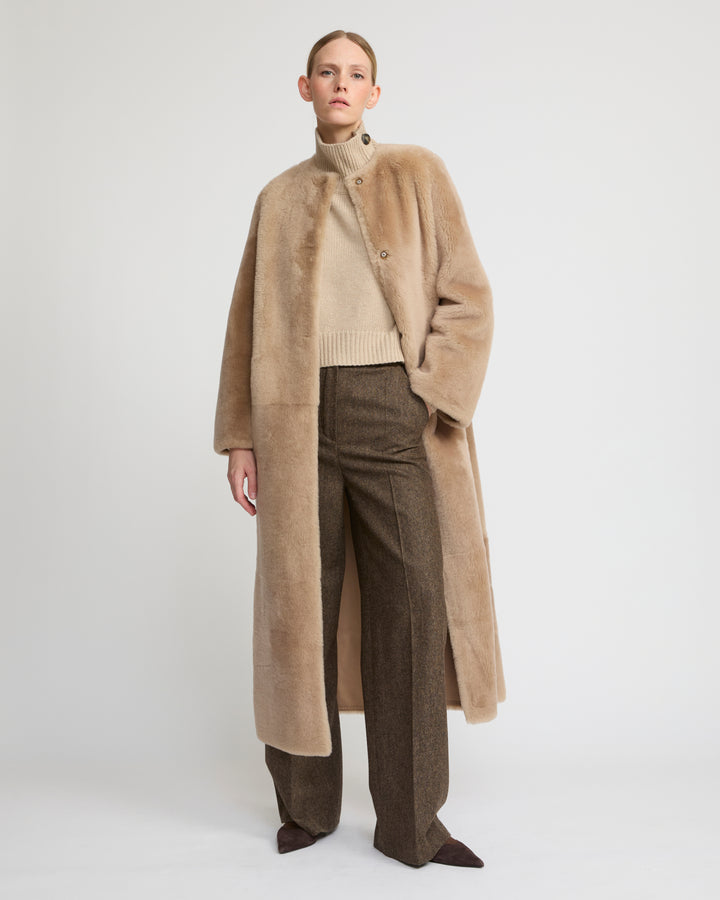 Extra long draped lambskin shearling coat