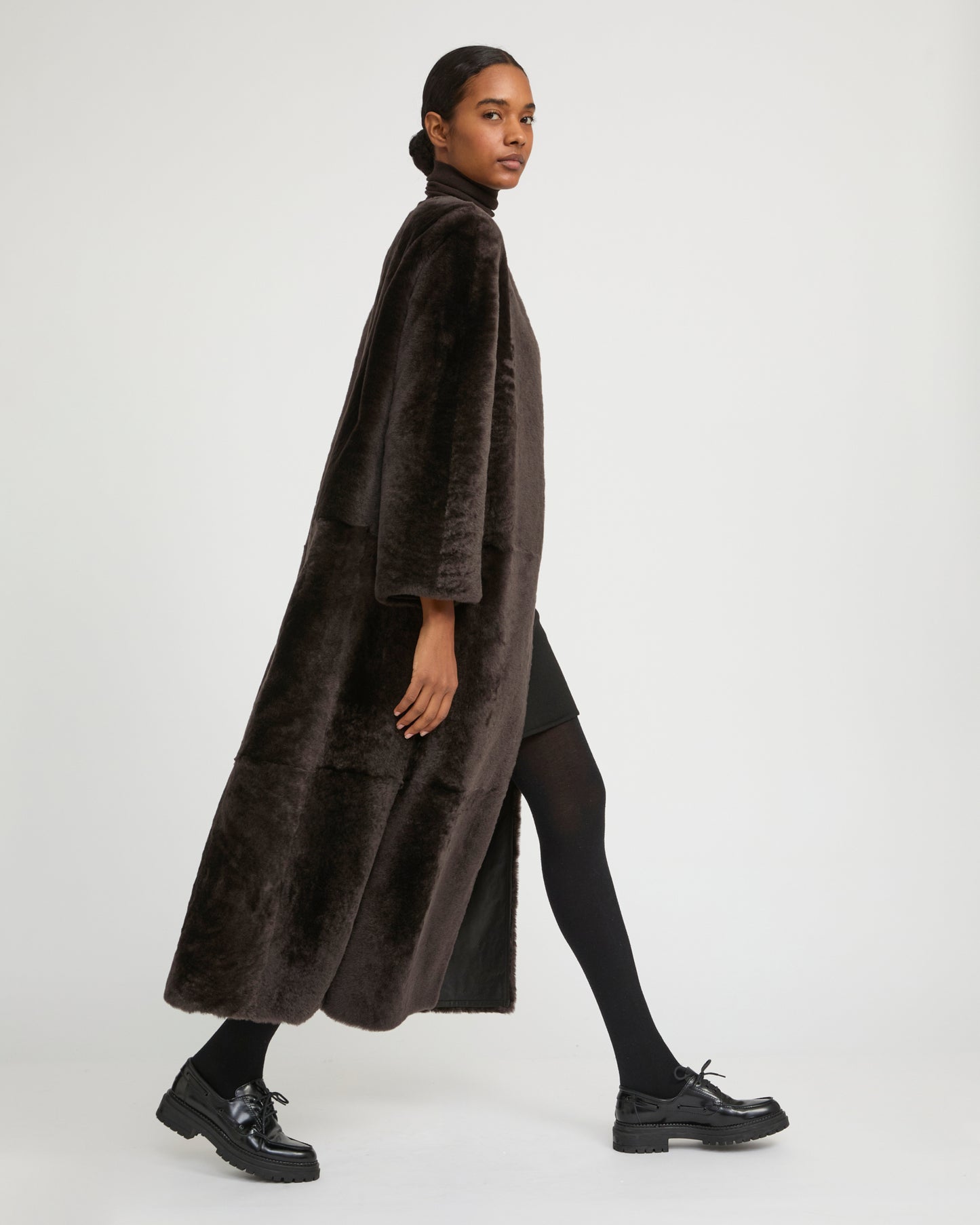 Extra long draped lambskin shearling coat