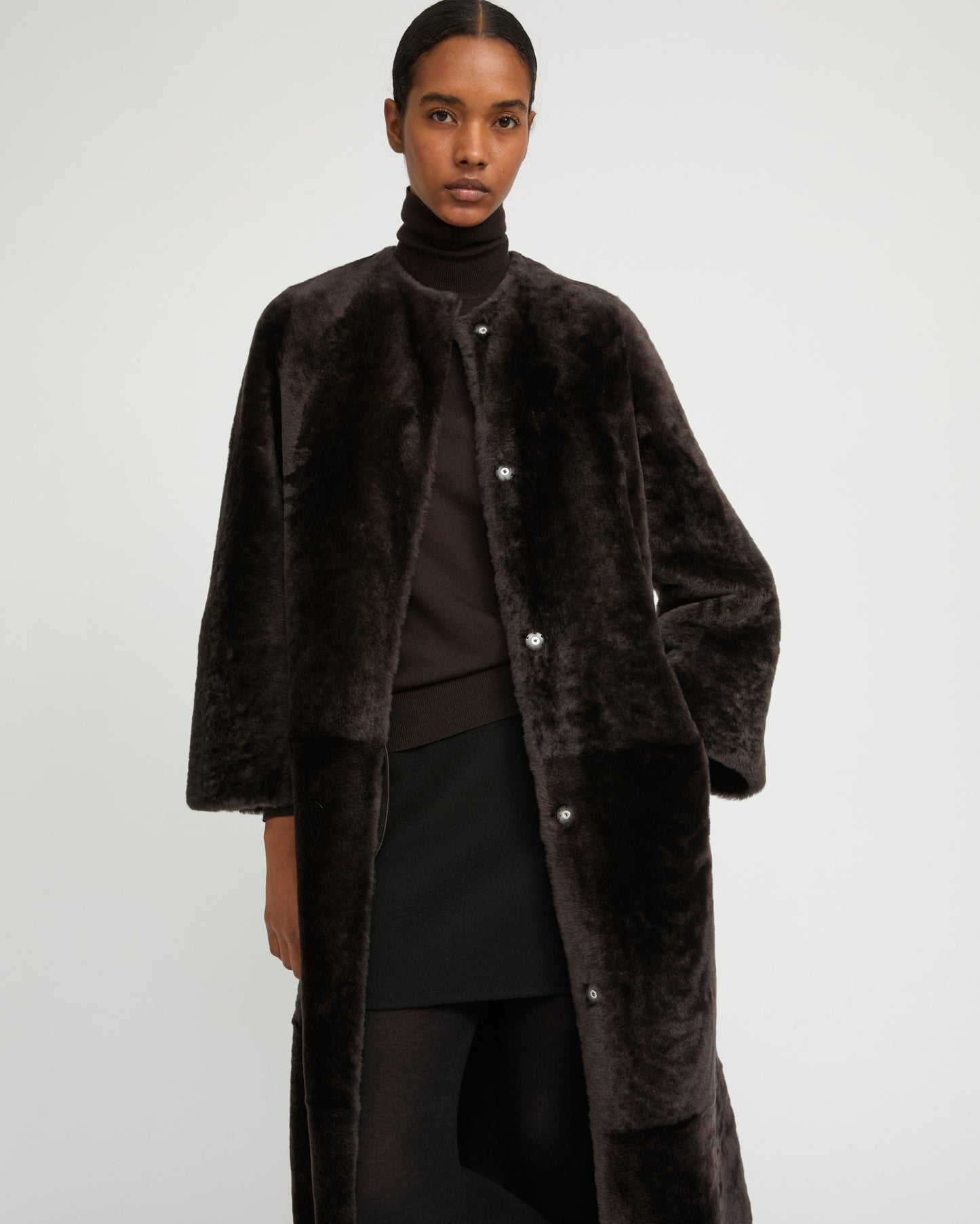 Extra long draped lambskin shearling coat