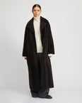 Double-breasted astrakan-style lambskin shearling coat