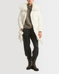 Long belted down jacket in technical fabric with fur collar