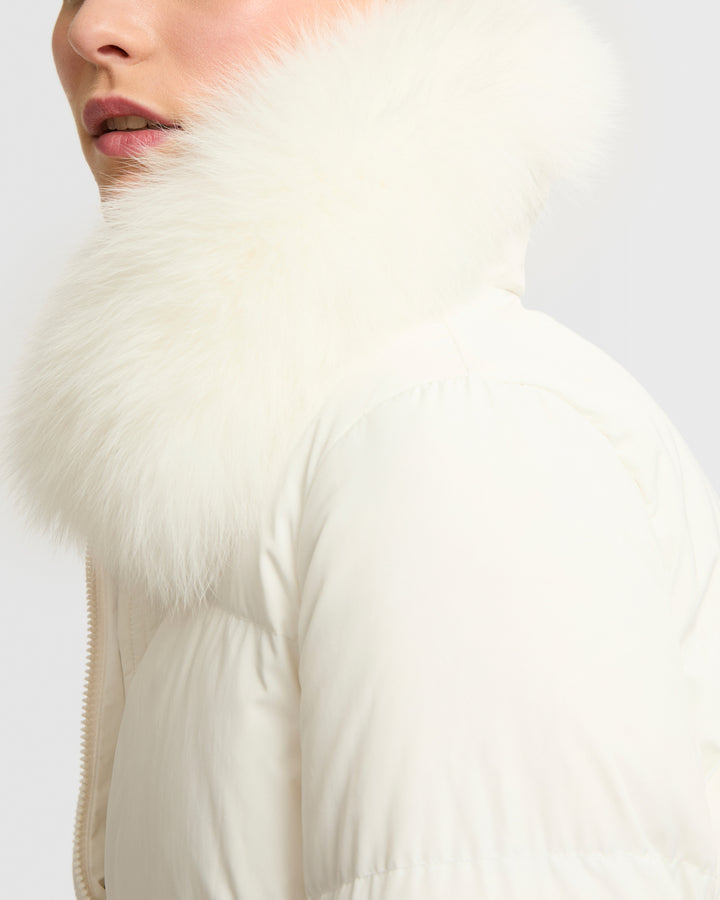 Long belted down jacket in technical fabric with fur collar
