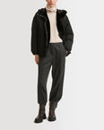 Hooded down jacket in technical fabric and mink fur