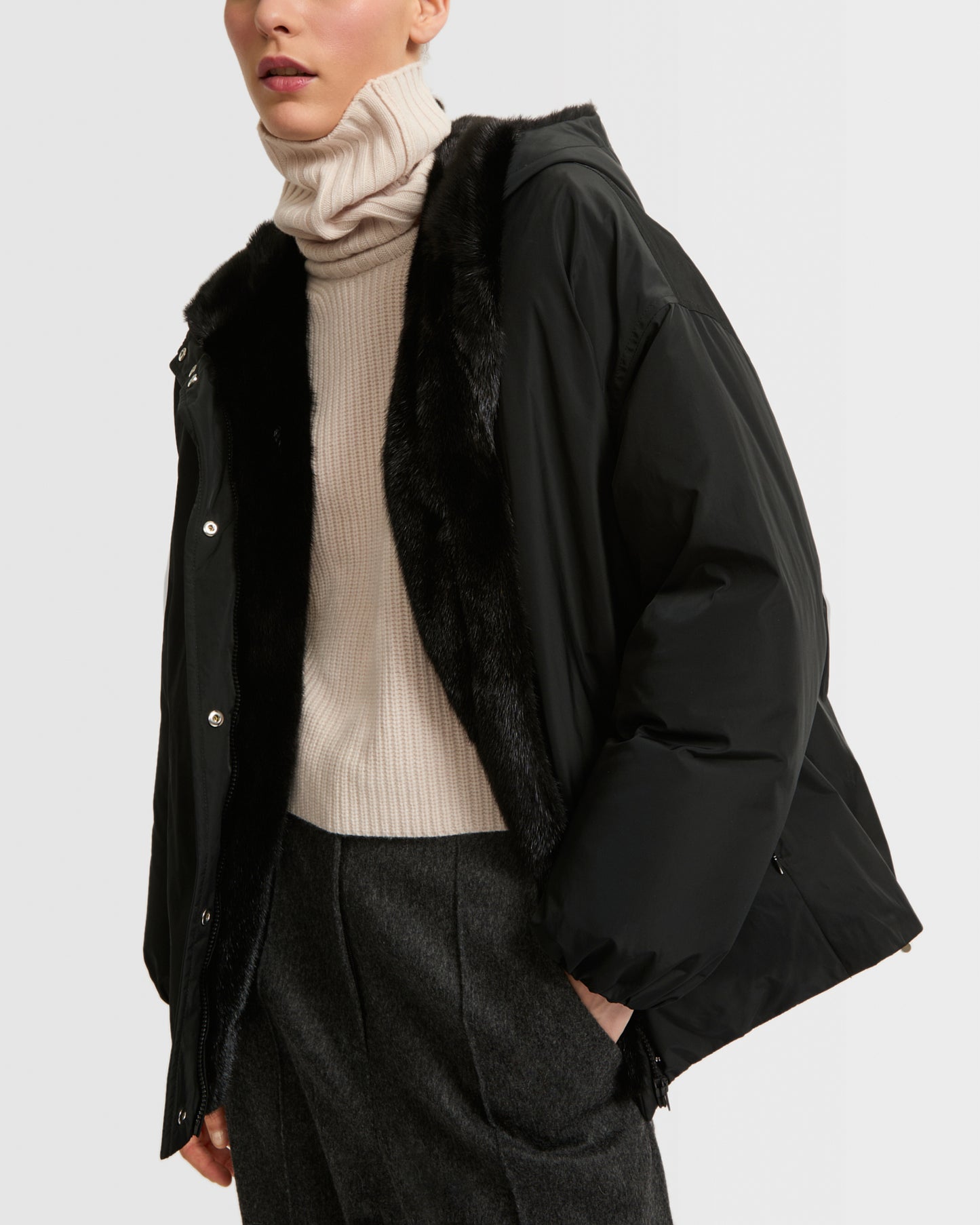 Hooded down jacket in technical fabric and mink fur
