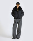Short technical fabric down jacket with detachable fox fur collar
