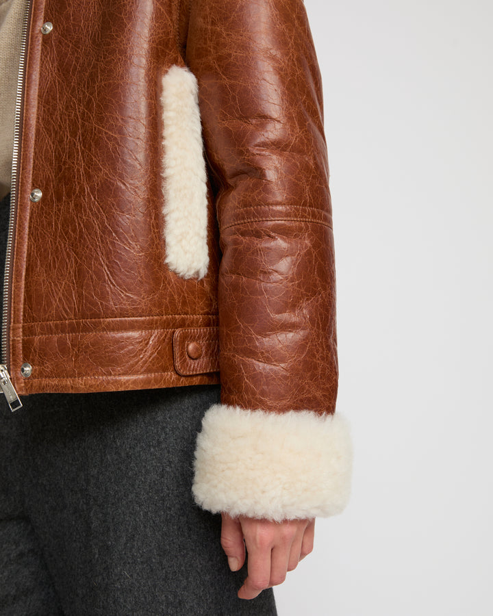 Short jacket in curly Tuscan shearling with vintage finish