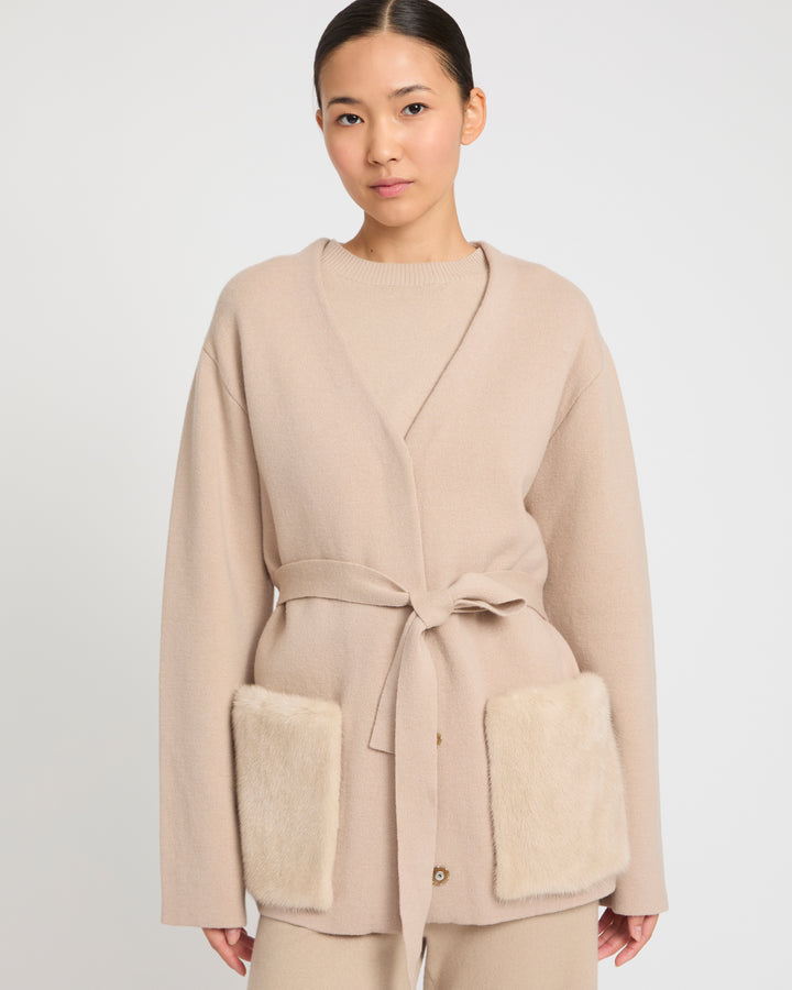 Belted knit and mink jacket