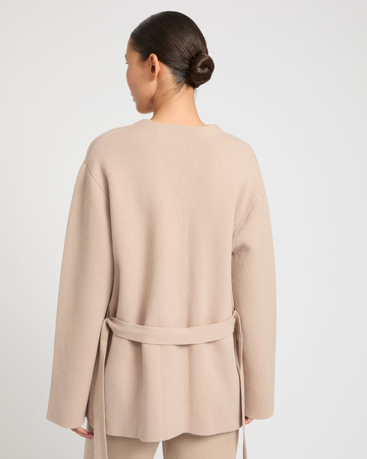 Belted knit and mink jacket