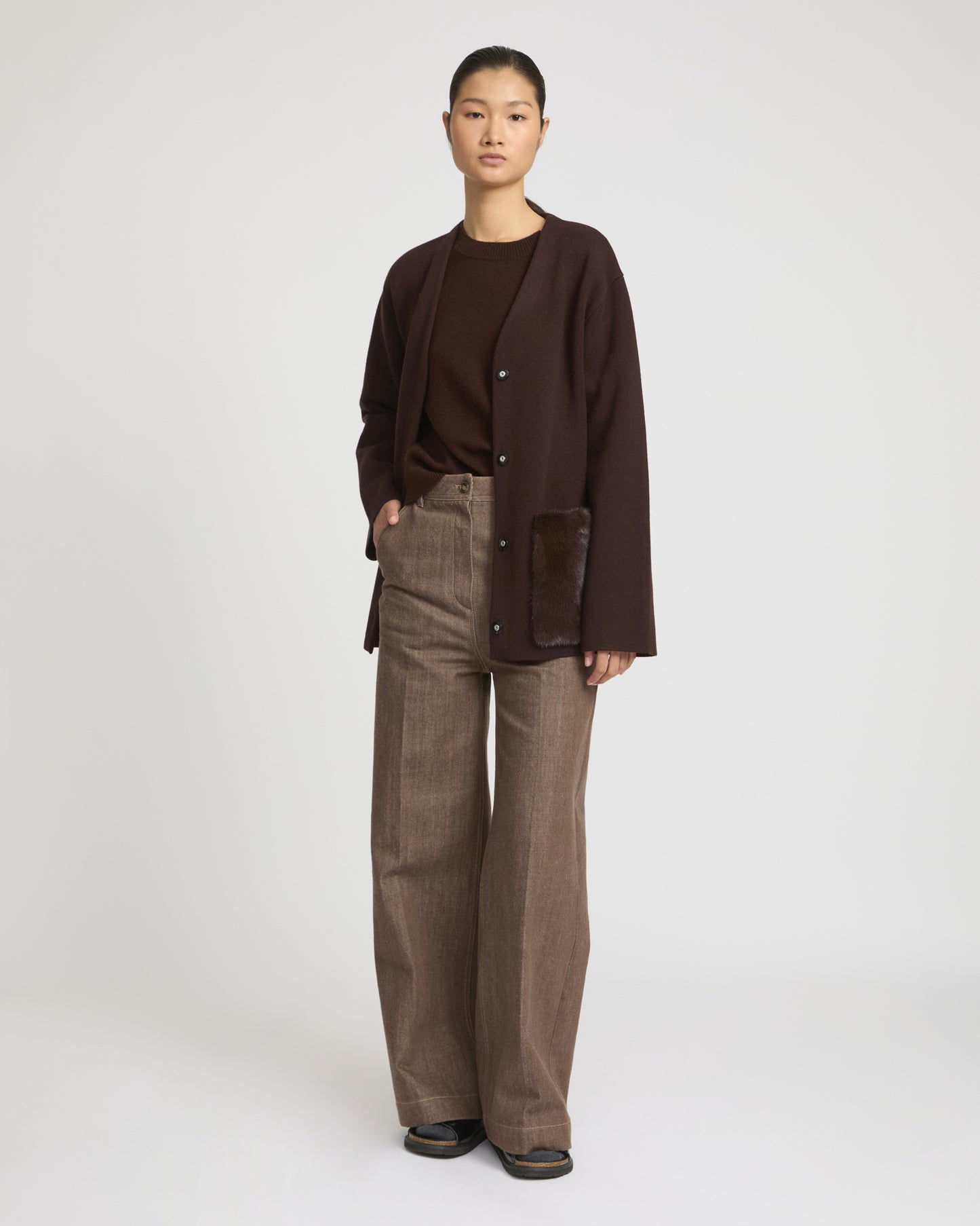 Belted knit and mink jacket