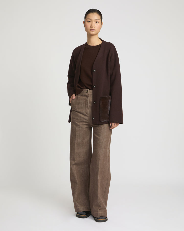 Belted knit and mink jacket