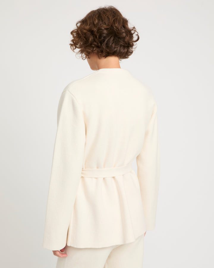 Belted knit and mink jacket