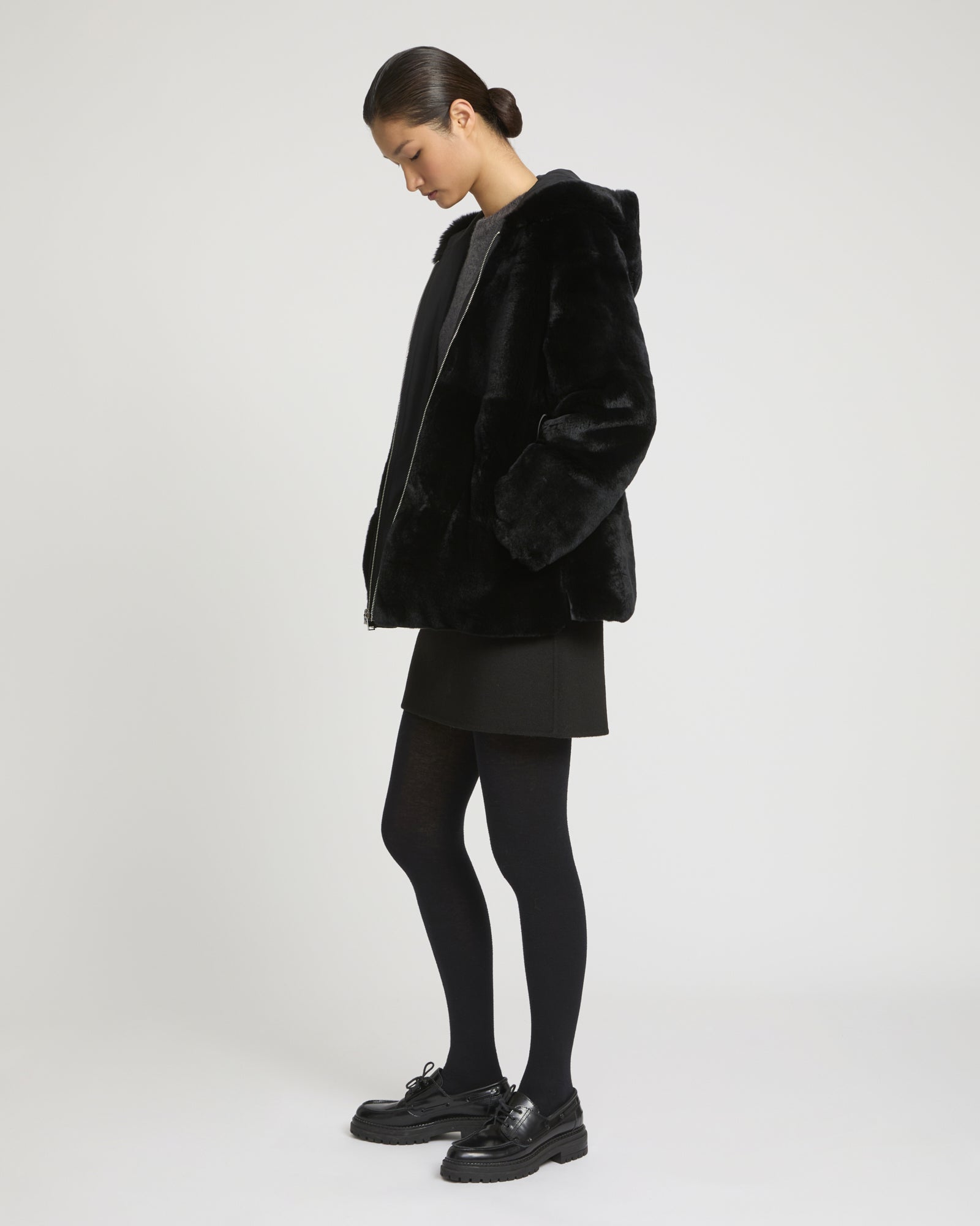 Reversible hooded jacket in rabbit rex fur and technical fabric