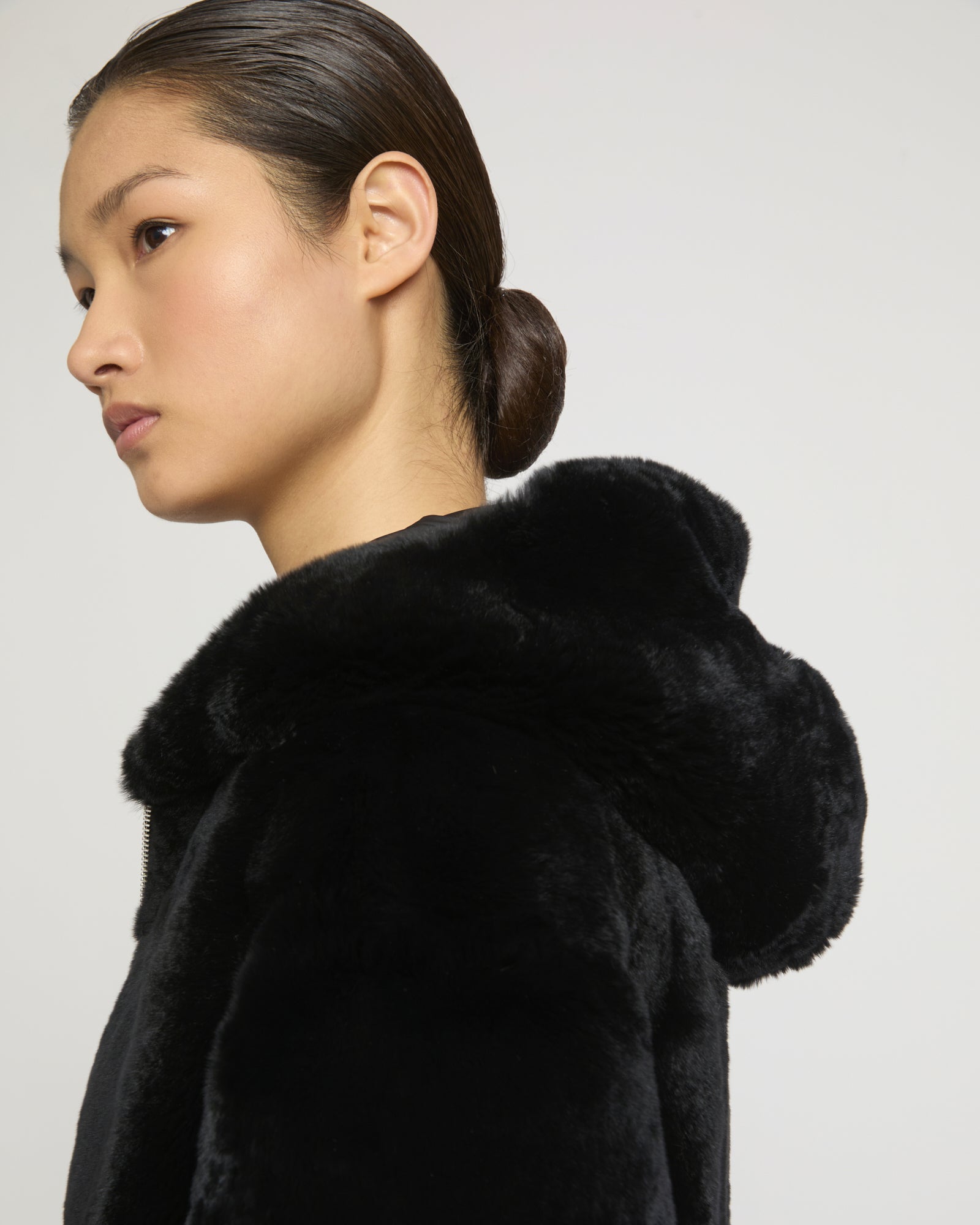Reversible hooded jacket in rabbit rex fur and technical fabric