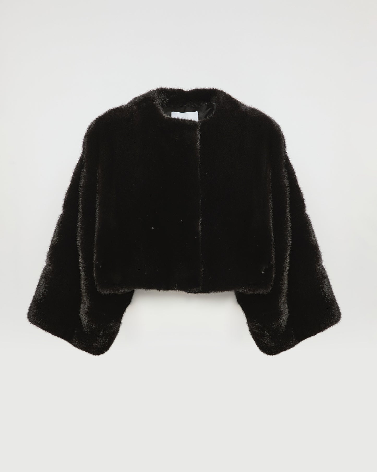 Short cape in long-haired mink fur