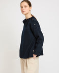 Double-sided funnel neck blouse