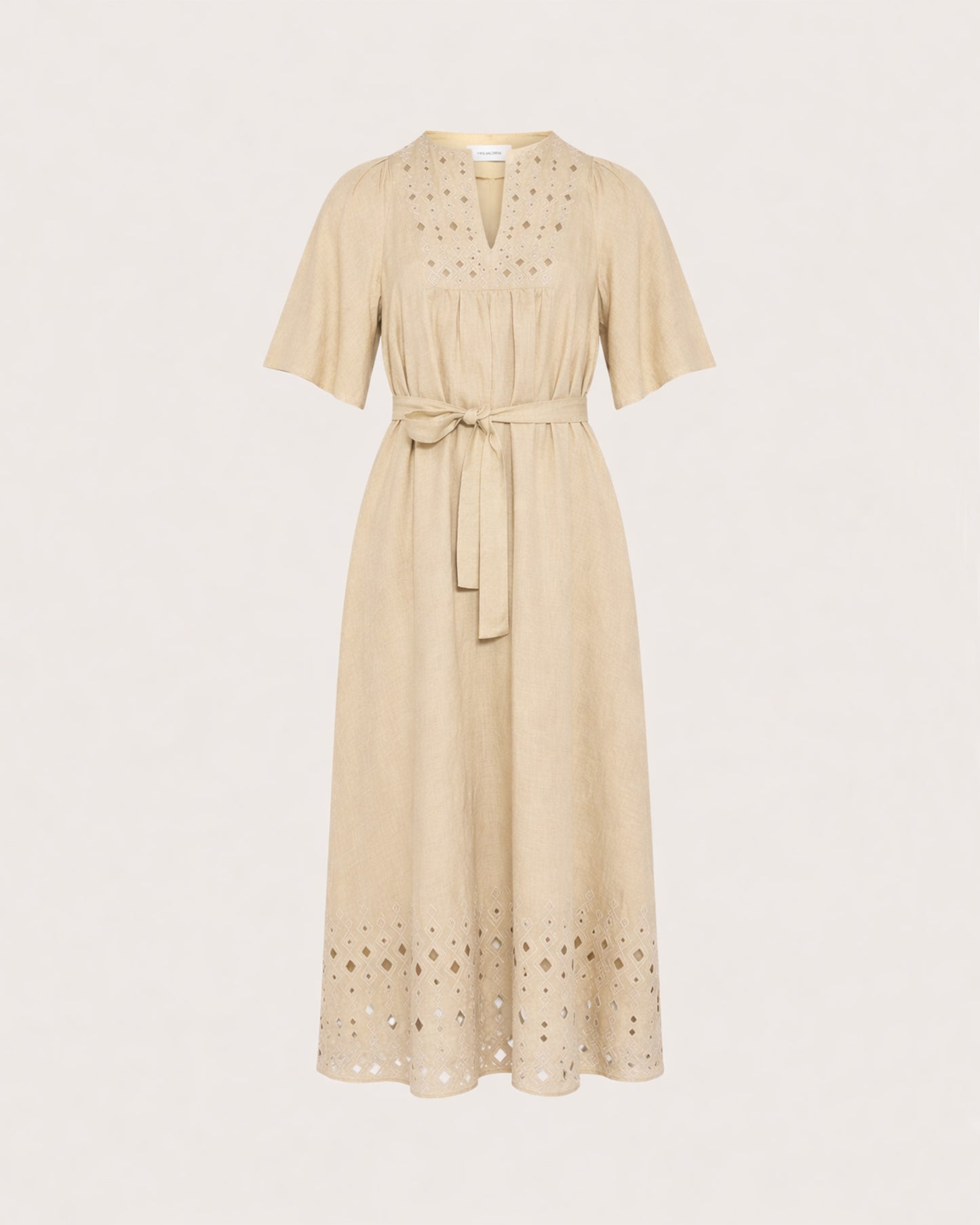 Flowing dress in embroidered linen