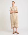Flowing dress in embroidered linen