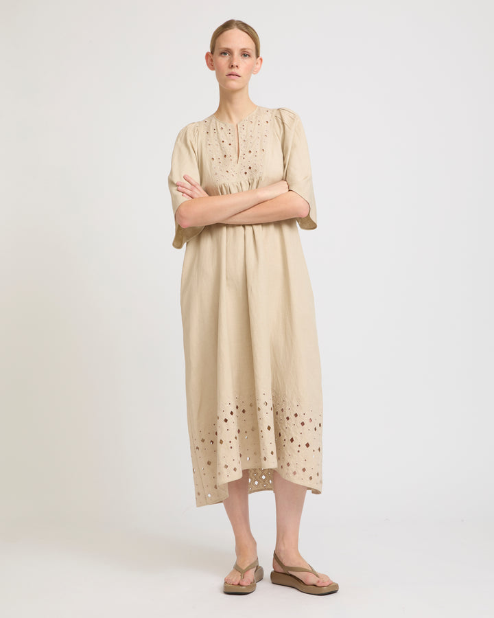 Flowing dress in embroidered linen