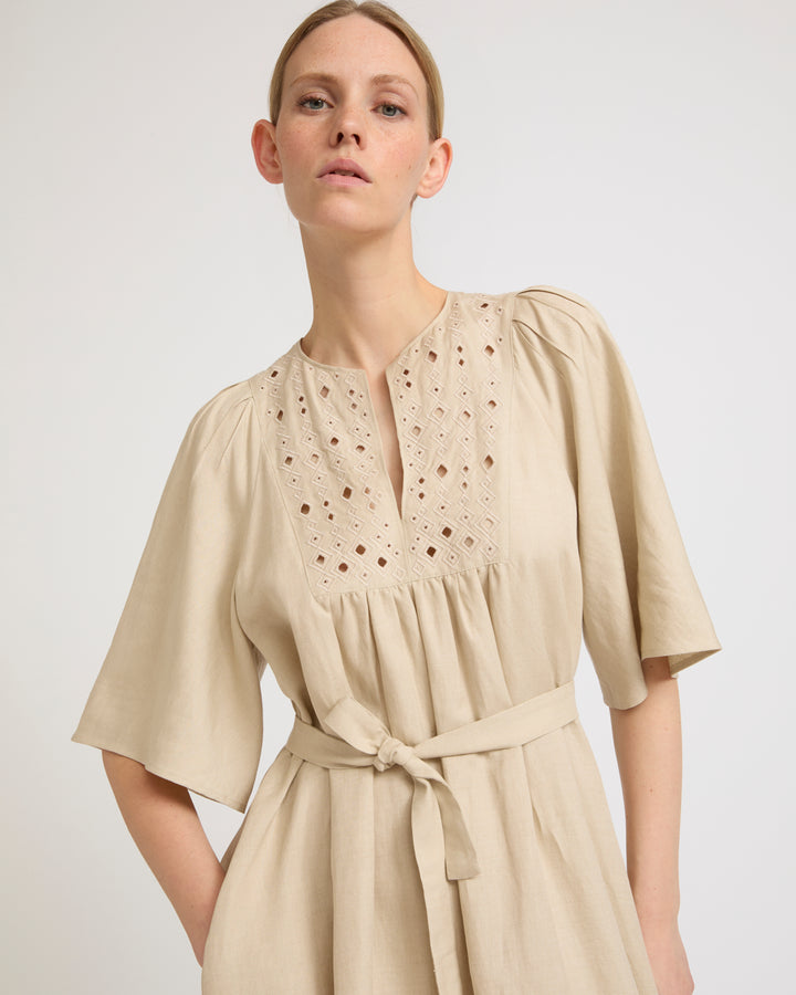 Flowing dress in embroidered linen