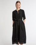 Flowing dress in embroidered linen