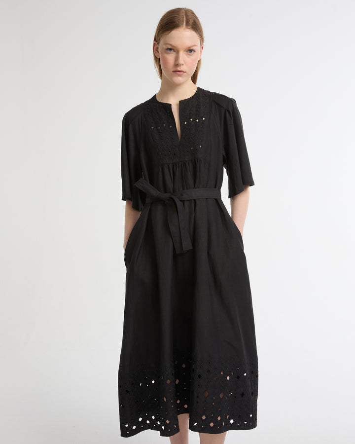 Flowing dress in embroidered linen
