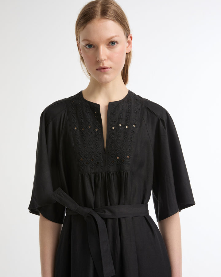 Flowing dress in embroidered linen