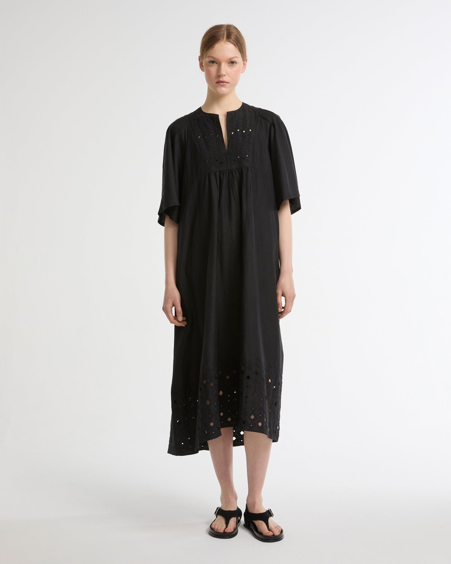 Flowing dress in embroidered linen