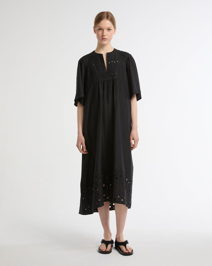 Flowing dress in embroidered linen