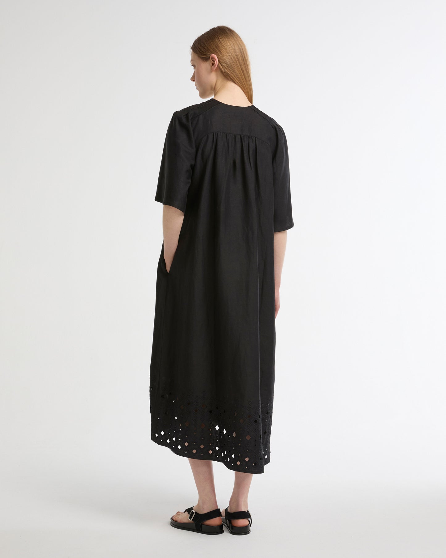 Flowing dress in embroidered linen