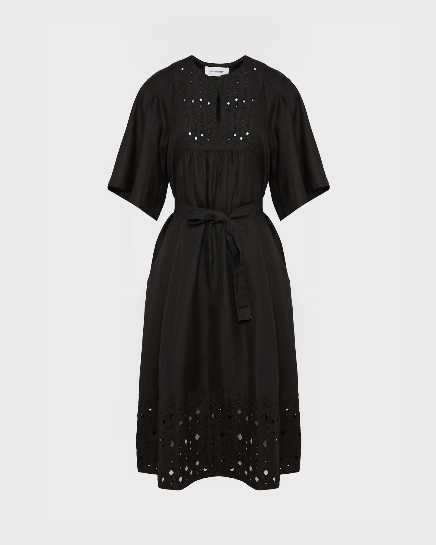 Flowing dress in embroidered linen