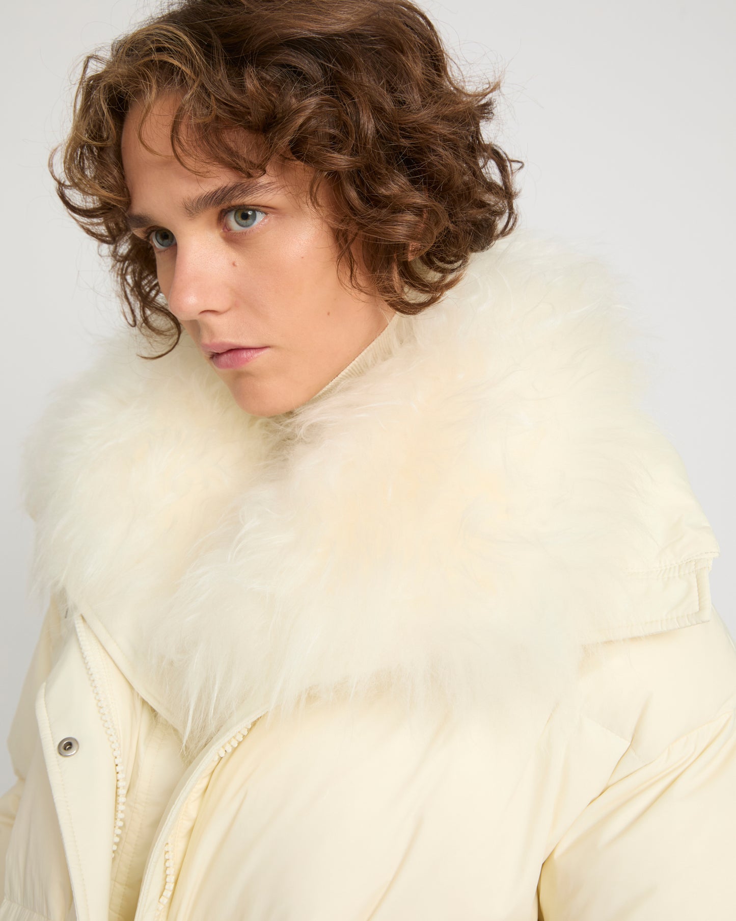 Mid-length down jacket with fluffy lambswool trim