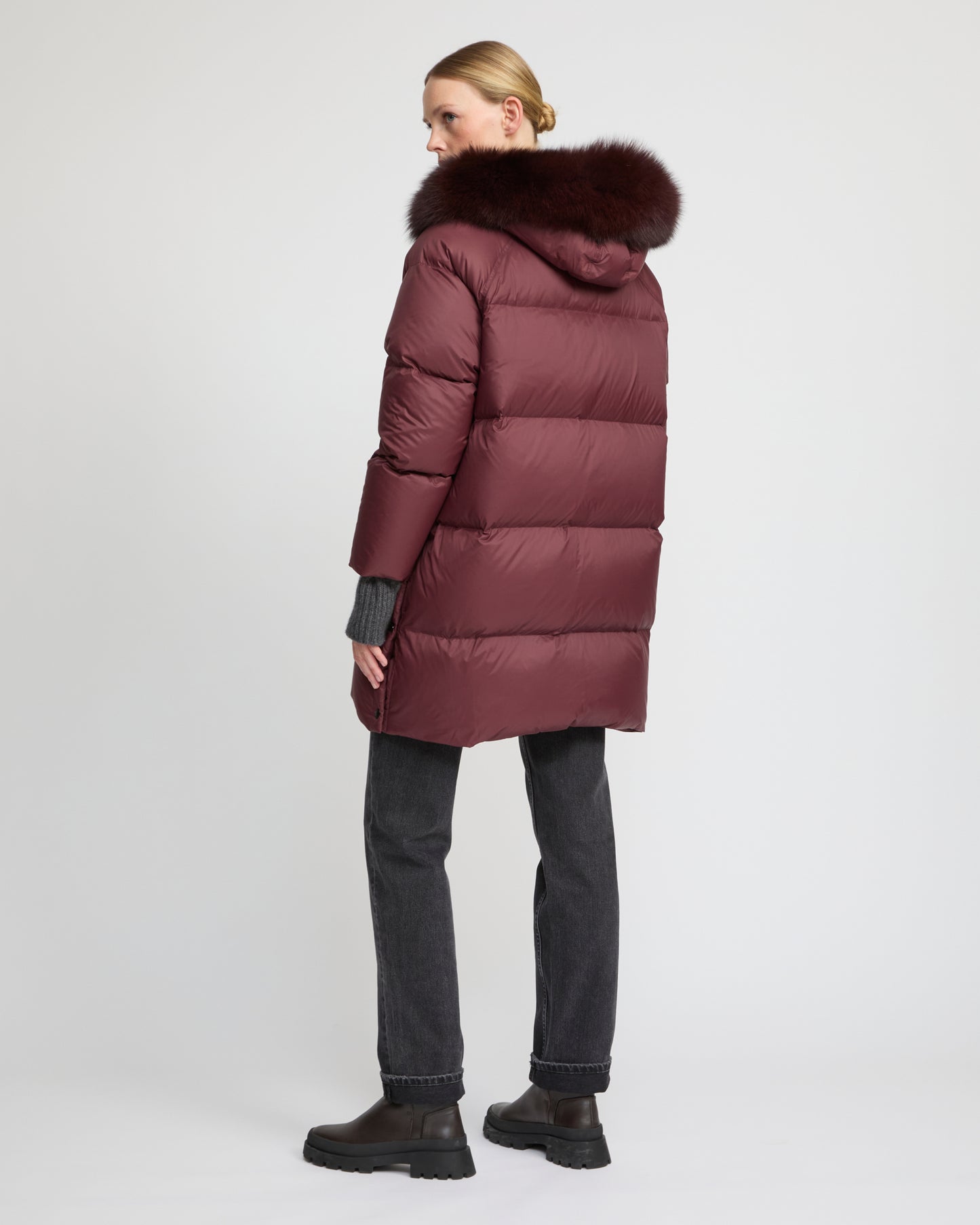 Long down jacket with raglan sleeves and fox fur trim