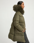 Long down jacket with raglan sleeves and fluffy lambswool trim