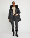 Long down jacket with raglan sleeves and fluffy lambswool trim