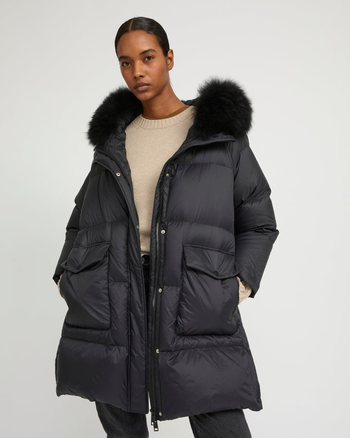 Long down jacket with raglan sleeves and fluffy lambswool trim