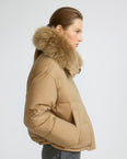 Short down jacket in waterproof technical fabric with airy lambswool trim