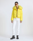 Short down jacket in waterproof technical fabric with airy lambswool trim