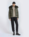 Short down jacket in waterproof technical fabric with airy lambswool trim