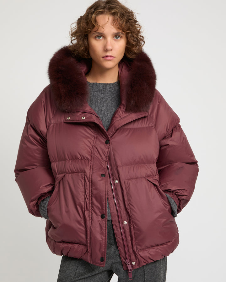 Short down jacket with raglan sleeves and fox fur trim